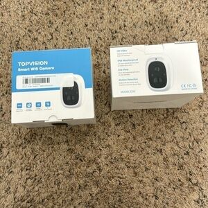NWT.  TOP VISION SMART WIFI CAMERA, HD, Weatherproof, 90 degree wide view.
